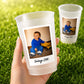 May include: A frosted plastic party cup featuring a square photograph of a toddler wearing a blue shirt and playing with a yellow toy truck. Below the photo, the text reads Vintage 2000 in a black script font. The cup has a smooth, translucent finish.